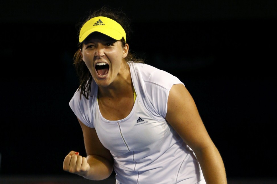 Laura Robson of Britain celebrates defeating Petra Kvitova of Czech Republic in her women's singles match at the Australian Open tennis tournament in Melbourne