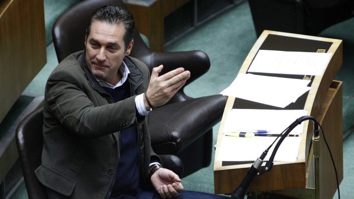 Head of FPOe Party Strache  gestures during a session of the parliament in Vienna