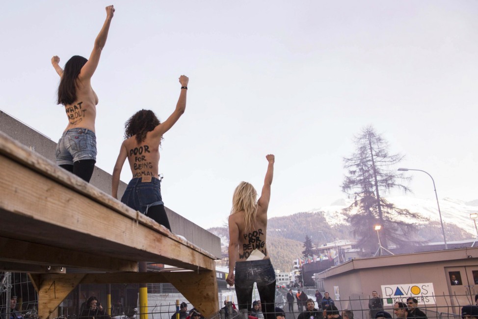Activist from Femen protests outside WEF in Davos