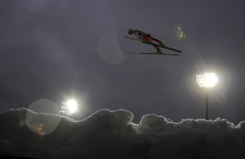 Simon Ammann of Switzerland soars through the air during his practice jump at the World Cup Ski Flying competition in Harrachov