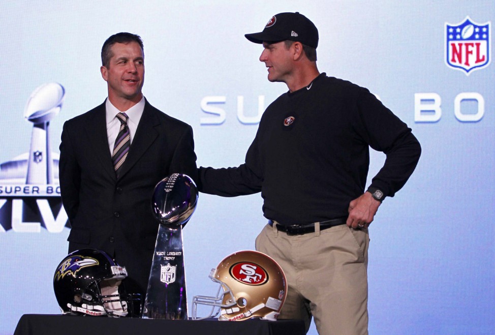 San Francisco 49ers head coach Jim and his brother, Baltimore Ravens head coach John Harbaugh, appear during their joint press conference ahead of the NFL's Super Bowl XLVII in New Orleans