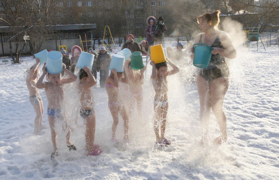 Children pour cold water on themselves during regular exercises in Krasnoyarsk