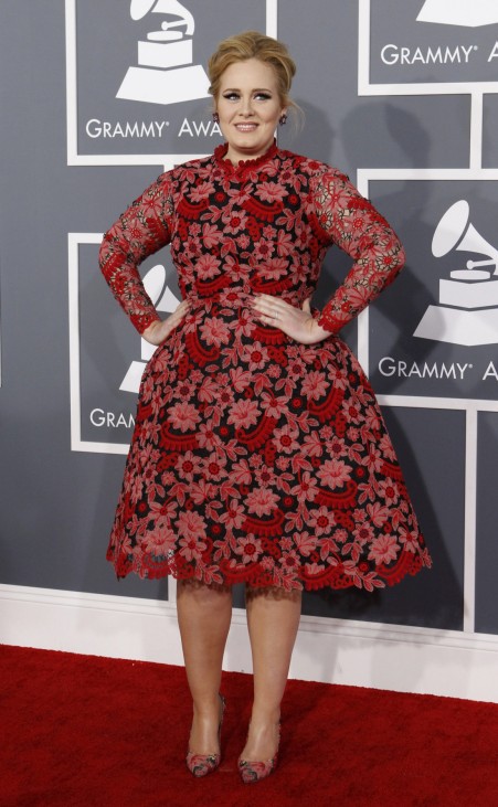 Singer Adele poses as she arrives at the 55th annual Grammy Awards in Los Angeles