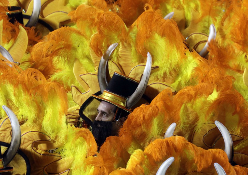 Revellers of the Unidos da Tijuca samba school participate in the annual carnival parade at Rio de Janeiro's Sambadrome