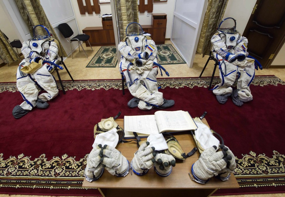 Spacesuits are left on chairs before cosmonauts' training session at the Russian cosmonaut training facility in Star City outside Moscow