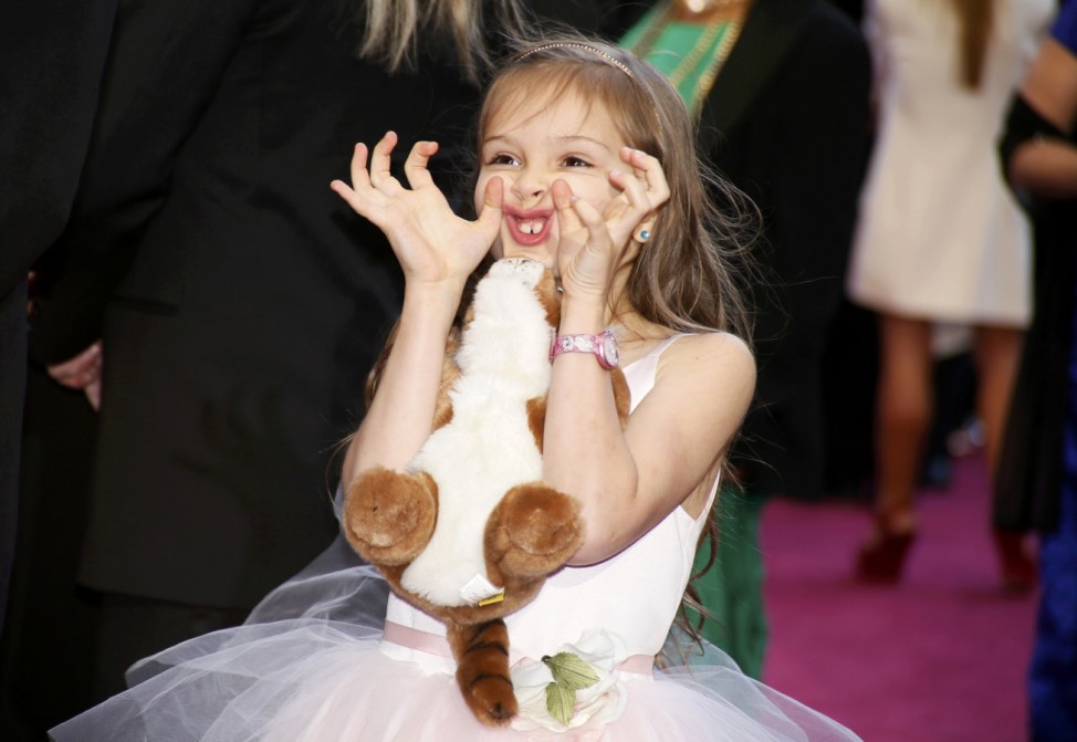 Sofia Miranda, daughter of Best Cinematography nominee Claudio Miranda for the film 'Life of Pi', makes a face at the 85th Academy Awards in Hollywood, California