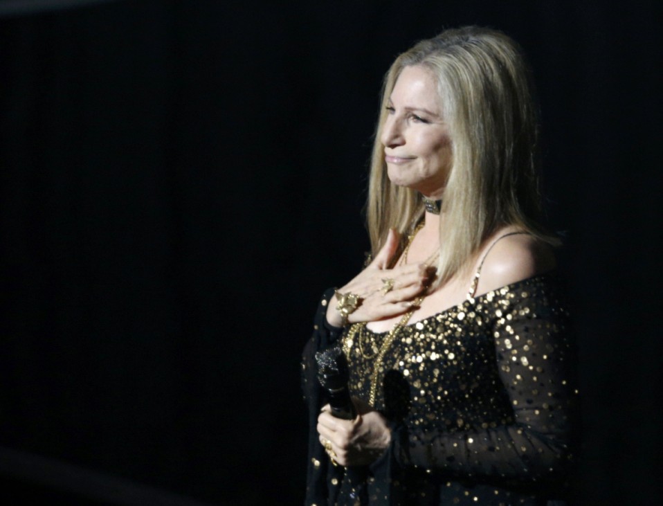 Barbra Streisand accepts the applause after performing the song 'Memories' at the 85th Academy Awards in Hollywood