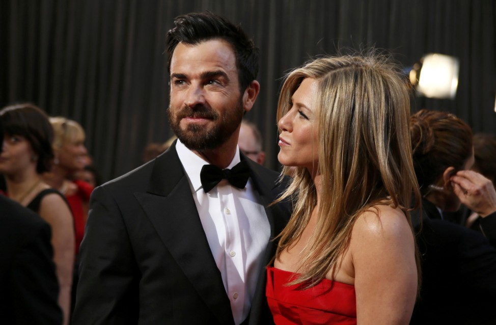 Actor and screenwriter Justin Theroux arrives with presenter fiancee Jennifer Aniston at the 85th Academy Awards in Hollywood, California
