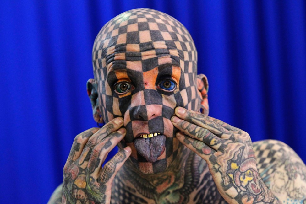 Matt Gone, also known as 'The Checkered Man', poses during the sixth Tattoo Expo in Saltillo
