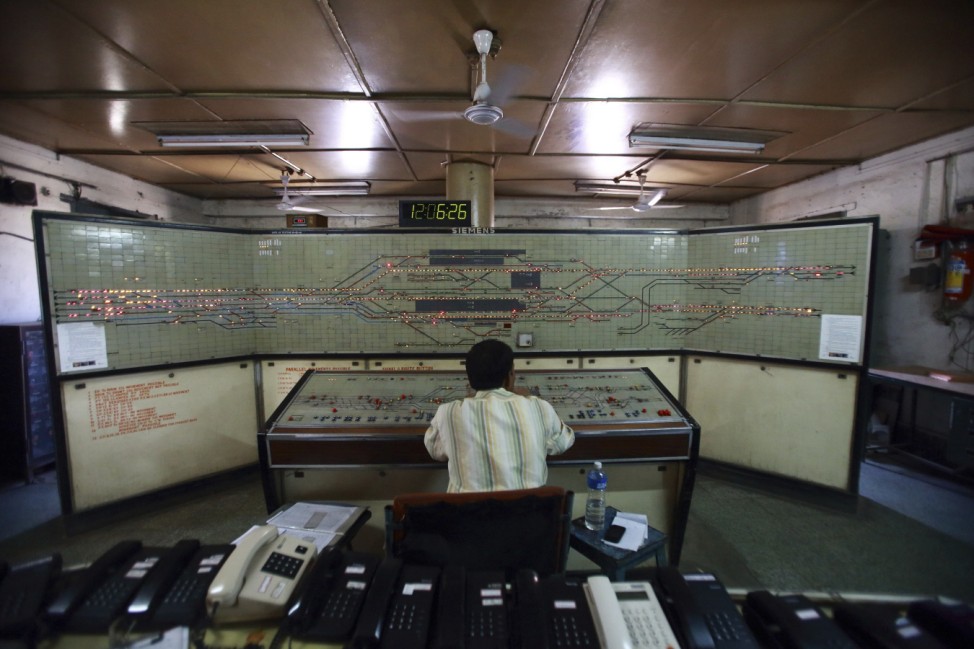 An employee works in the control room of Kalyan Railway Station in Mumbai