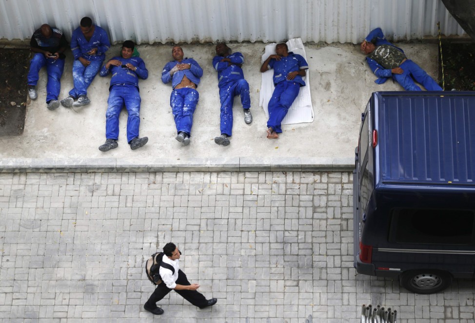 Workers from the Rio Museum of Art (MAR) relax during their lunch time, in Rio de Janeiro