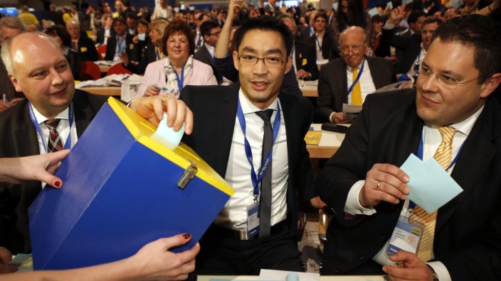 German Economy Minister Roesler and leader of the FDP casts his vote during a convention in Berlin