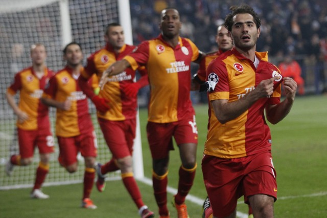 Altintop of Galatasaray celebrates his goal against Schalke 04 during their Champions League soccer match in Gelsenkirchen