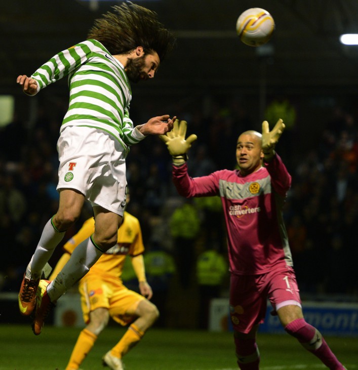 Celtic's Georgios Samaras scores against Motherwell during their Scottish Premier League soccer match at Fir Park Stadium in Motherwell, Scotland