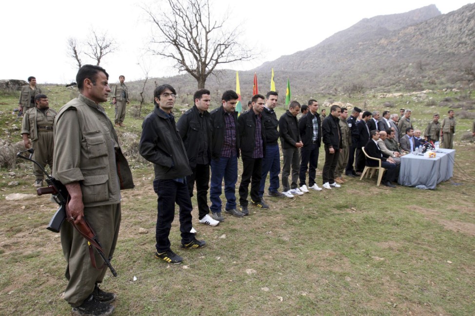 File photo showing Turkish soldiers and officials (wearing black coats) who had been held captive by PKK militants are seen before they are released in the northern Iraqi city of Dohuk