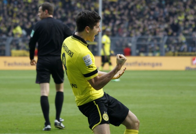 Borussia Dortmund's Lewandowski celebrates a goal against Augsburg during the German first division Bundesliga soccer match in Dortmund