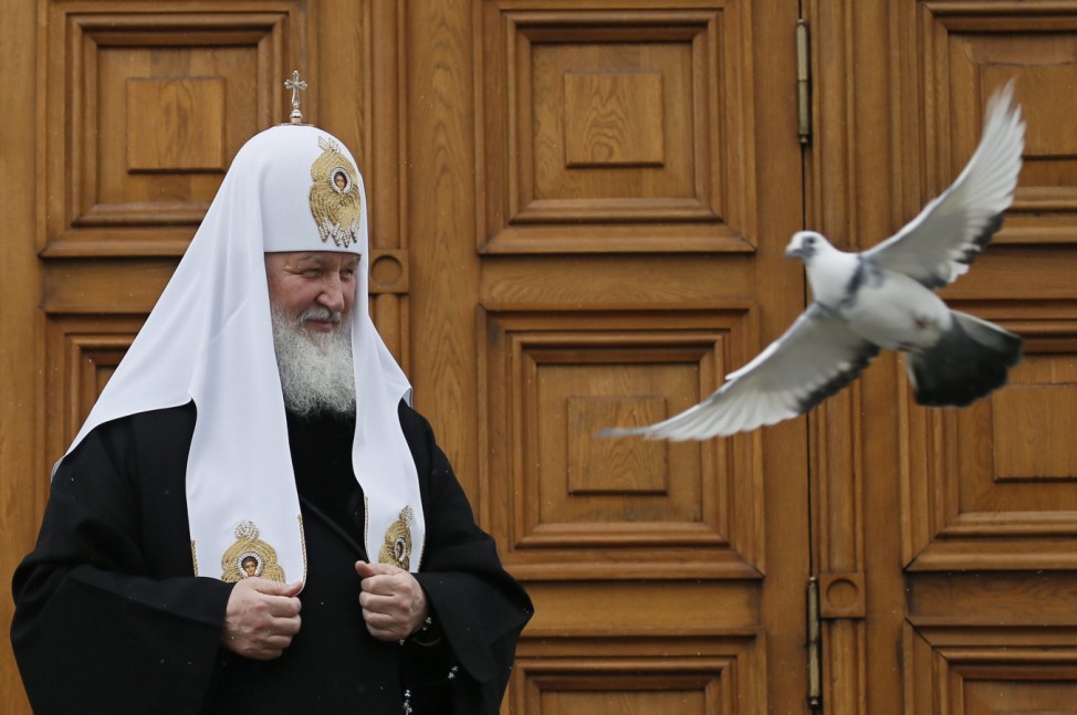 Russian Orthodox Patriarch Kirill  accompanied releases doves aft