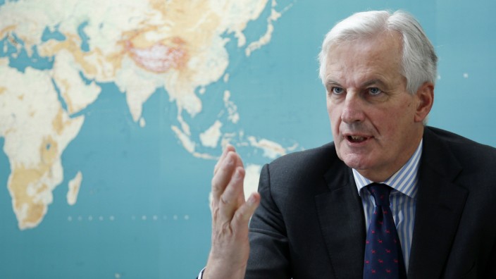 EU Commissioner Barnier answers reporters' questions during an interview with Reuters in Brussels