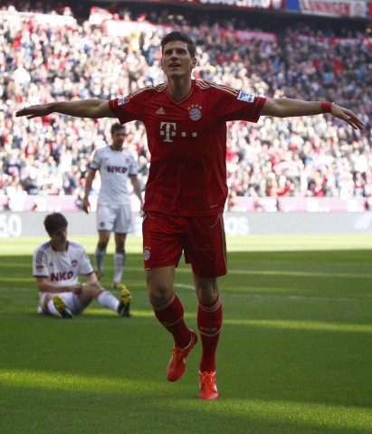 Bayern Munich's Mario Gomez celebrates a goal during the German first division Bundesliga soccer match against Nuremberg in Munich
