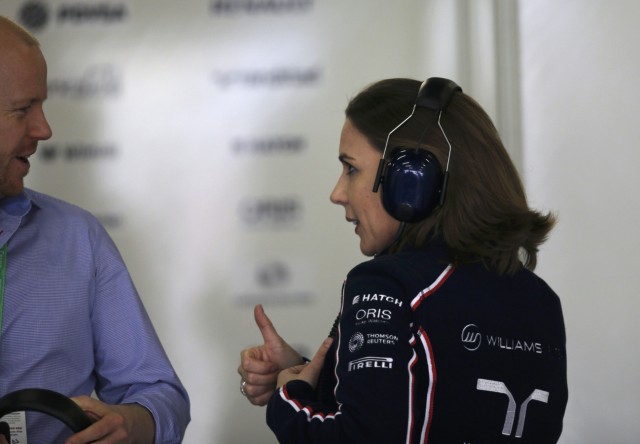 Williams Formula One acting team principal Claire Williams speaks to an unidentified man during the second practice session of the Chinese F1 Grand Prix at the Shanghai International circuit