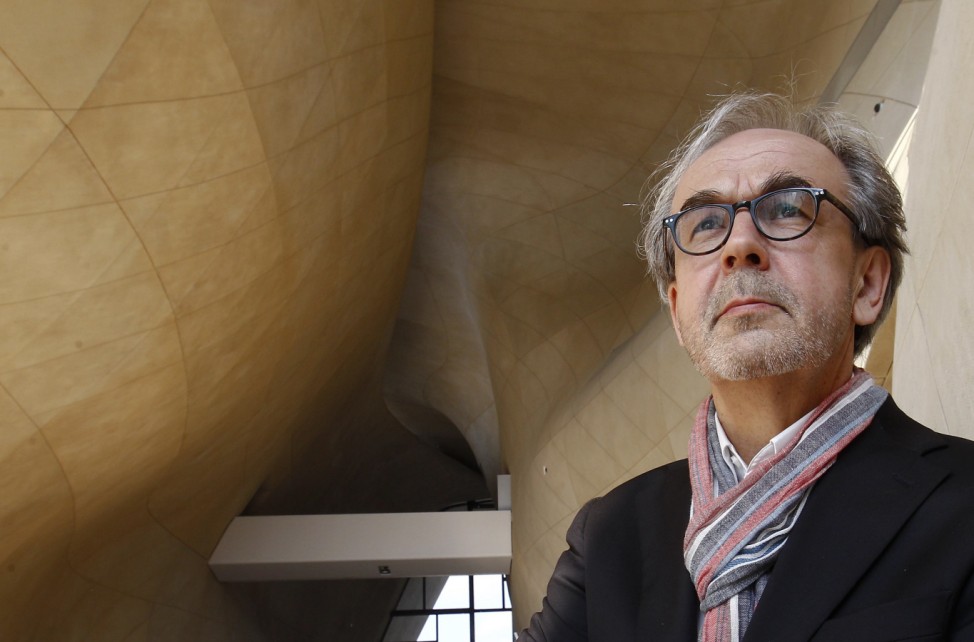 Architect Mahlamaki poses for a photograph at  the main hallway of the newly constructed building of the Museum of the History of the Polish Jews in Warsaw