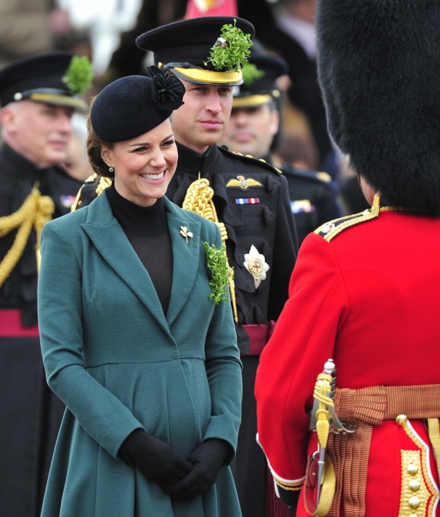 Britain's Catherine, Duchess of Cambridge smiles during a visit with her husband, Prince William, to attend a St Patrick's Day Parade at Mons Barracks in Aldershot