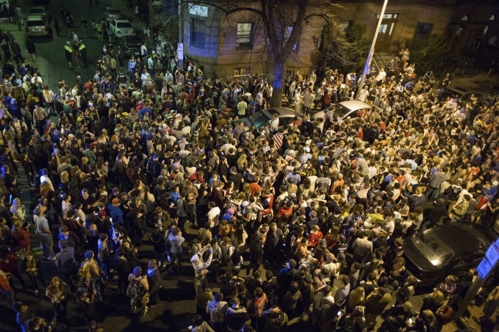 Northeastern University students gather to celebrate the capture of suspected Boston Marathon bomber Dzhokhar Tsarnaev in Boston