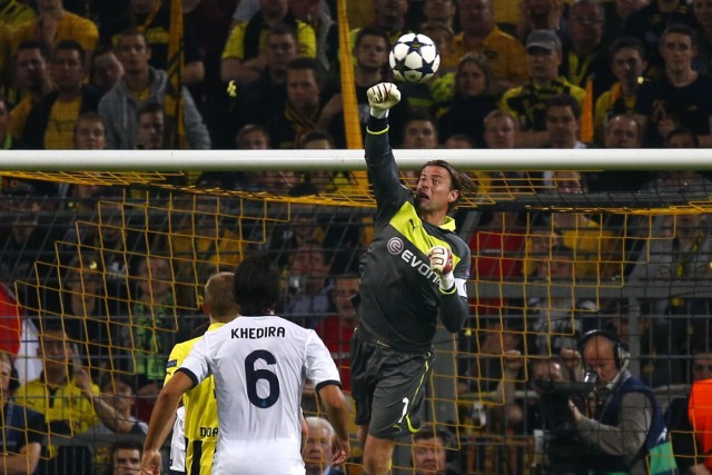 Borussia Dortmund's Weidenfeller makes save against Real Madrid in Champions League semi-final first leg soccer match in Dortmund