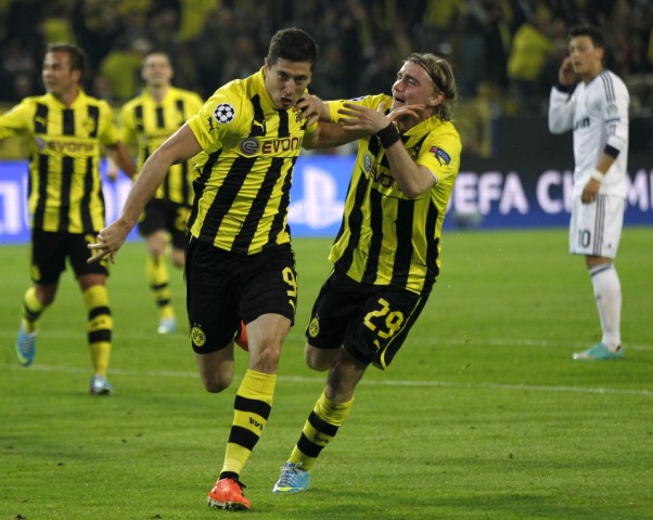 Borussia Dortmund's Lewandowski celebrates scoring hatrick against Real Madrid in Champions League semi-final first leg soccer match in Dortmund
