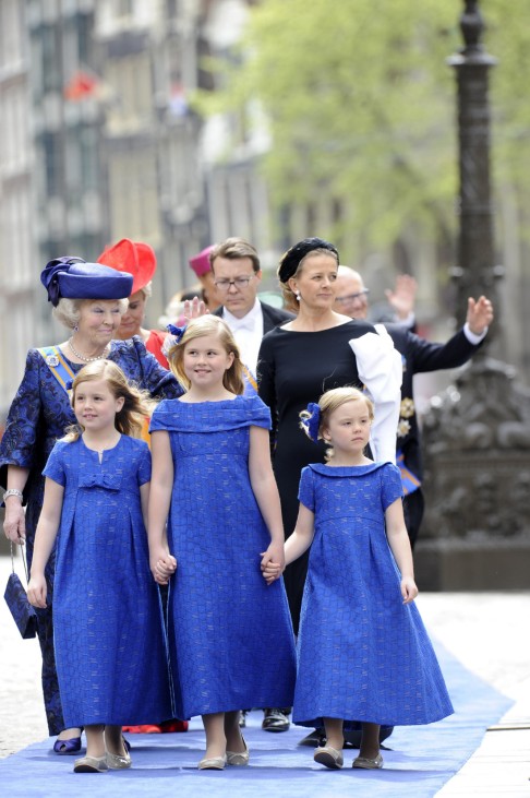 Netherlands Princess Beatrix follows the granddaughters Crown Princess Catharina-Amalia Princess Alexia and Princess Ariane arrive to the Nieuwe Kerk church in Amsterdam before the religious crowning cerminony