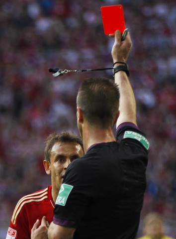 Bayern Munich's Rafinha gets a red card during their German first division Bundesliga soccer match against Borussia Dortmund in Dortmund