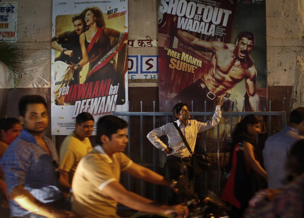 Ram Pratap Verma, a 32-year-old aspiring Bollywood film actor, waits outside a cinema after a film screening in Mumbai