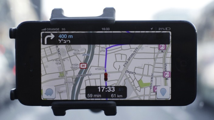 Waze, an Israeli mobile satellite navigation application, is seen on a smartphone in this photo illustration taken in Tel Aviv