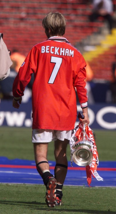 MANCHESTER'S BECKHAM LEAVES WEMBLEY HOLDING THE F.A. CUP