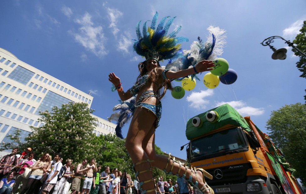 Reveller performs during the Karneval der Kulturen (Carnival of Cultures) a street parade of Berlin's ethnic minorities