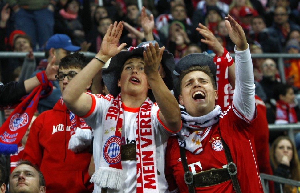 Supporters of Bayern Munich react during public viewing event in Munich