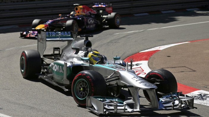 Mercedes Formula One driver Rosberg of Germany steers his car ahead of compatriot Red Bull Formula One driver Vettel during the Monaco F1 Grand Prix