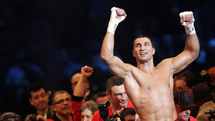 Ukrainian heavyweight boxing world champion Klitschko celebrates after defeating Pianeta in Mannheim
