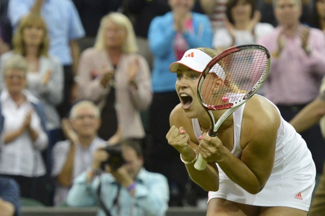 Angelique Kerber of Germany celebrates after defeating Sabine Lisicki of Germany in their women's quarter-final tennis match at the Wimbledon tennis championships in London