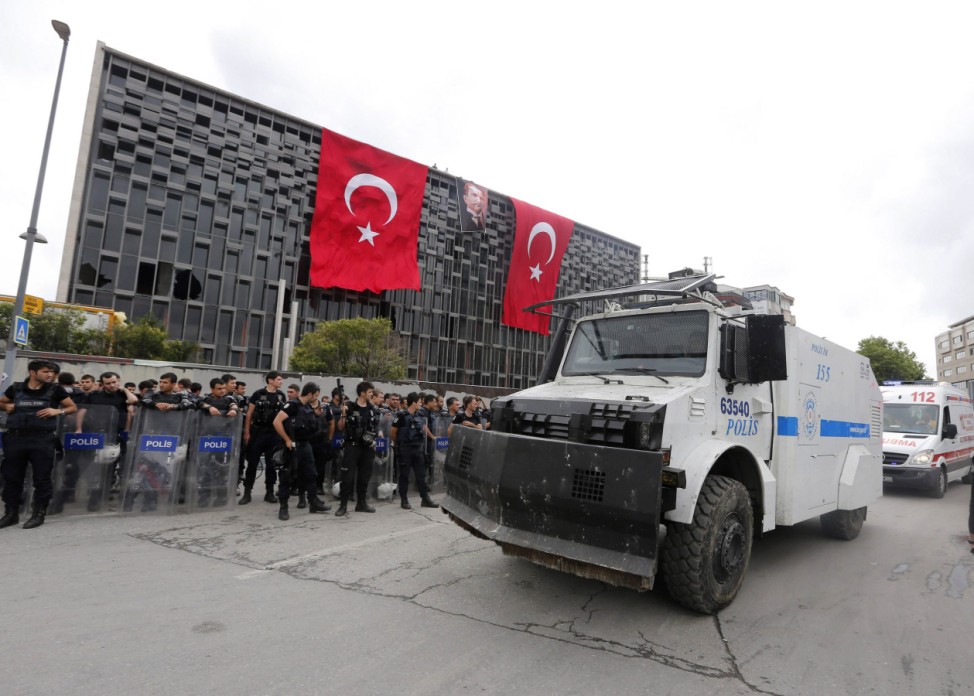 Turkish riot police take up position at Taksim Square in Istanbul