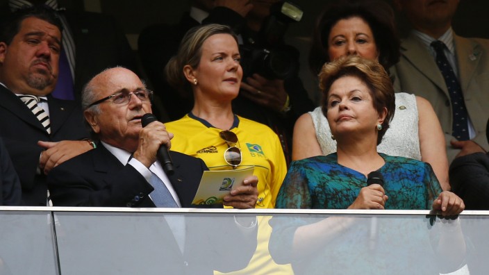 FIFA President Blatter speaks next to Brazil's President Rousseff before the Confederations Cup Group A soccer match at Estadio Nacional in Brasilia