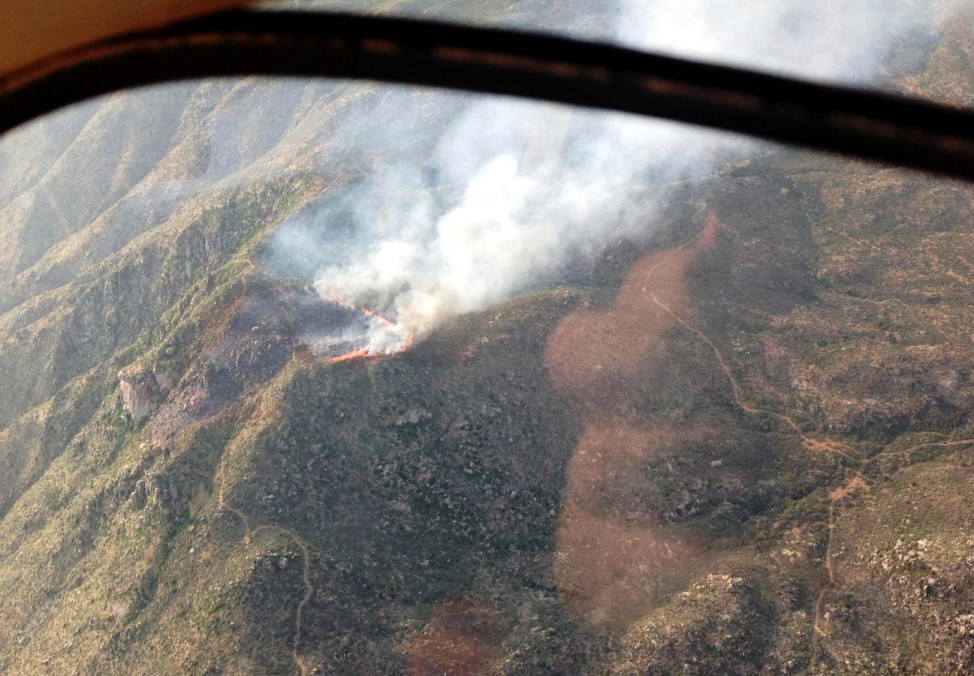 Handout photo shows an aerial view shows of the Yarnell Hill fire burning near Yarnell, Arizona