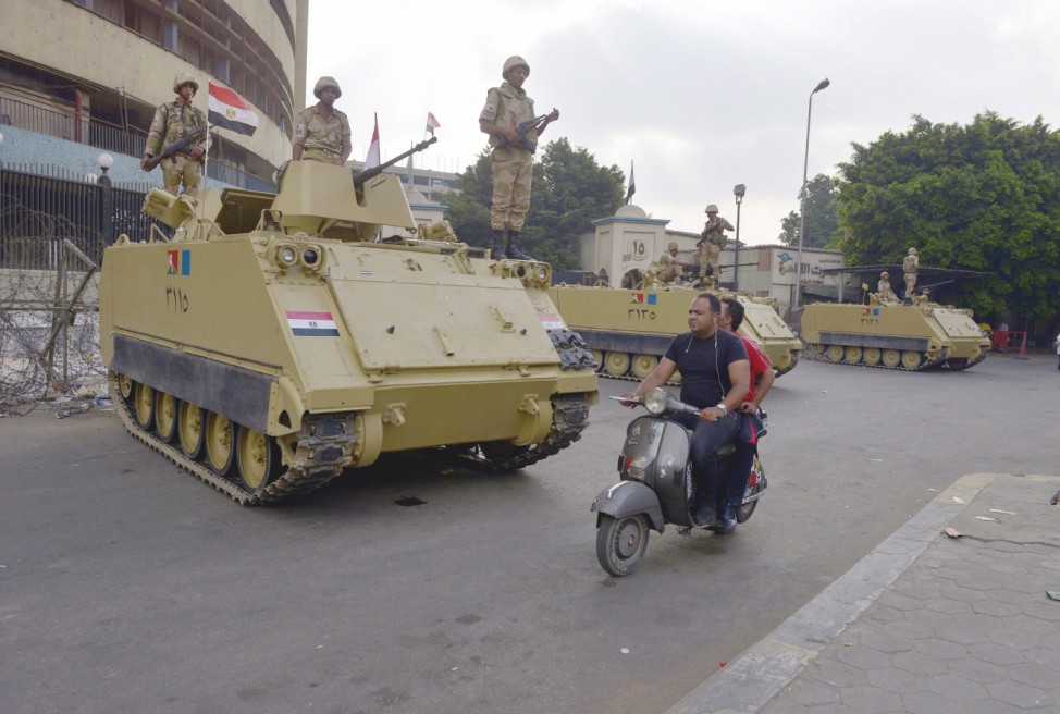 Egyptian army forces guard government-run TV building
