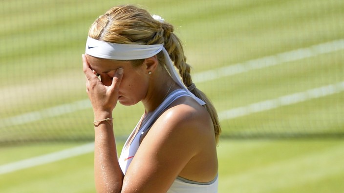 Sabine Lisicki of Germany reacts during her women's singles final tennis match against Marion Bartoli of France at the Wimbledon Tennis Championships, in London