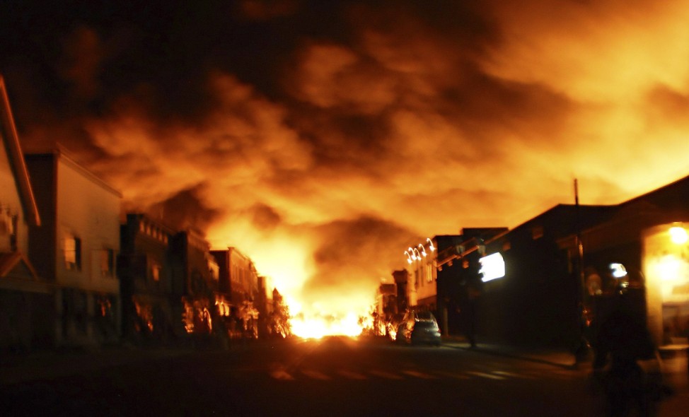 Fire from a train explosion is seen in Lac Megantic