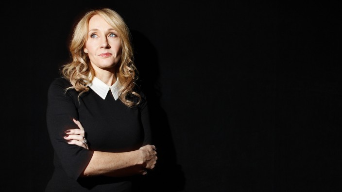 Author Rowling poses for a portrait while publicizing her adult fiction book 'The Casual Vacancy' in New York