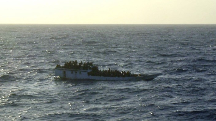 A picture released by the Australian Maritime and Safety Authority (AMSA) shows a boat which according to the AMSA was taken mid-morning before the boat sank near Christmas Island