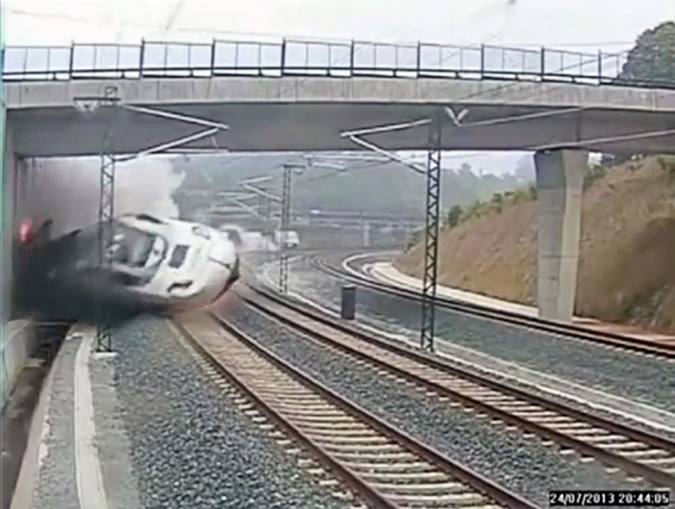 A train derails in this still image from the video of a security camera near Santiago de Compostela,
