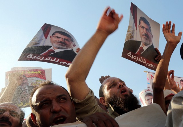 Supporters and opponents of ousted President Morsi protest