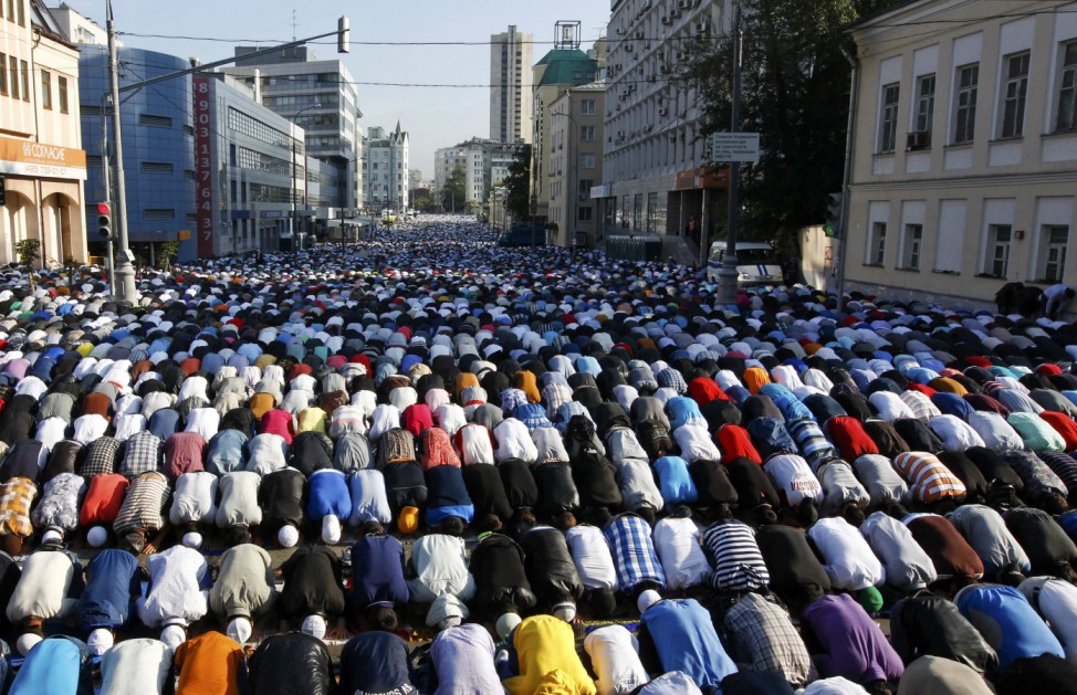 Thousands of believers take part in morning prayers to celebrate the first day of Eid-al-Fitr in Moscow